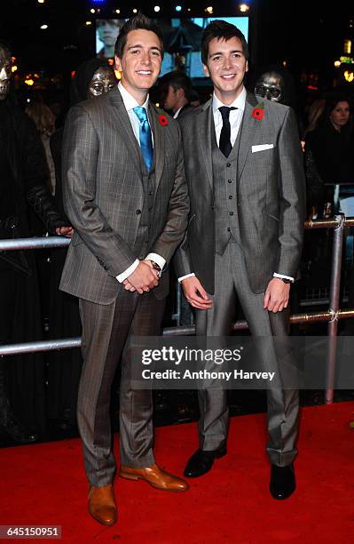 Actors James Phelps and Oliver Phelps attend the 'Harry Potter and the Deathly Hallows Part 1' World Premiere at the Odeon Cinema, Leicester Square...