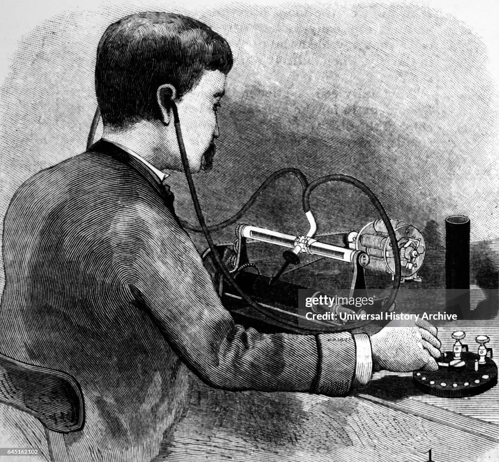 Listening to Charles Sumner Tainter's Graphophone.