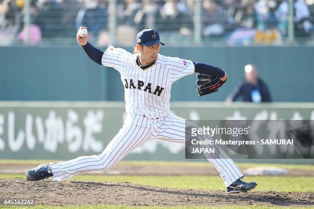 Ryo Akiyoshi of Samurai Japan pitches in the ninth inning during the SAMURAI JAPAN Friendly Opening Match between SAMURAI JAPAN and Fukuoka SoftBank...