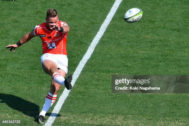 Riaan Viljoen of Sunwolves kicks the ball during the Super Rugby Rd 1 game between Sunwolves and Hurricanes at Prince Chichibu Memorial Ground on...
