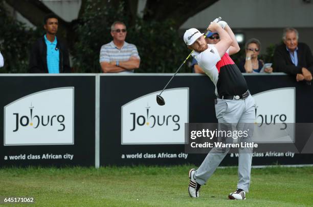 Garrick Porteous of South Africa tees off on the first hole during the third round of the Joburg Open at Royal Johannesburg and Kensington Golf Club...
