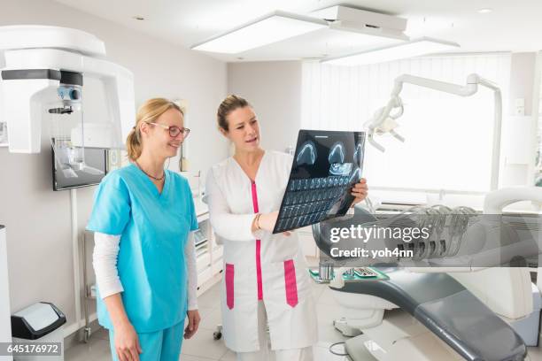 dental exam & result of x-ray image - dental imaging stock pictures, royalty-free photos & images