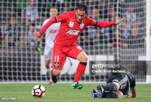 Alan Baro of the Victory and Sergio Cirio of United compete for the ball during the round 21 A-League match between Melbourne Victory and Adelaide...