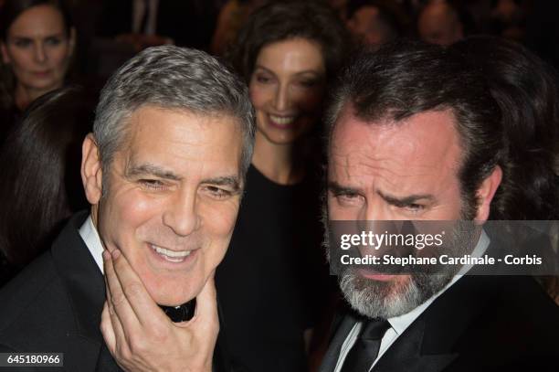George Clooney and Jean Dujardin during the Cesar Film Awards 2017 ceremony at Salle Pleyel on February 24, 2017 in Paris, France.