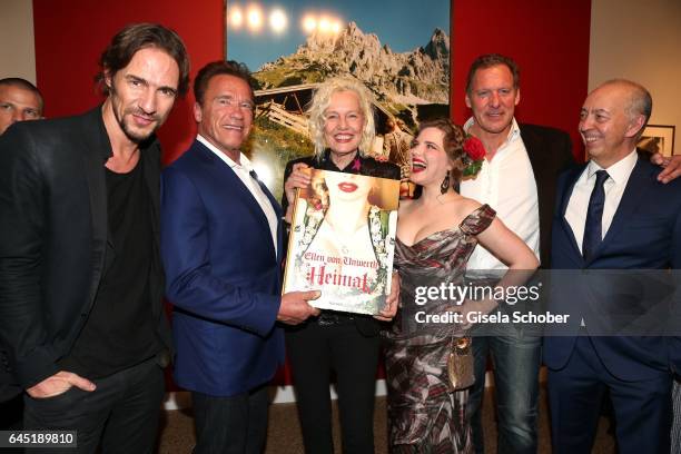 Thomas Hayo, Arnold Schwarzenegger, Photographer Ellen von Unwerth and Syrie Moskowitz, Ralf Moeller and Benedikt Taschen during the opening night of...