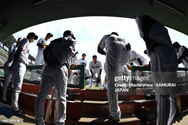 Samurai Japan team members get ready for the SAMURAI JAPAN Friendly Opening Match between SAMURAI JAPAN and Fukuoka SoftBank HAWKS at the Sun Marine...