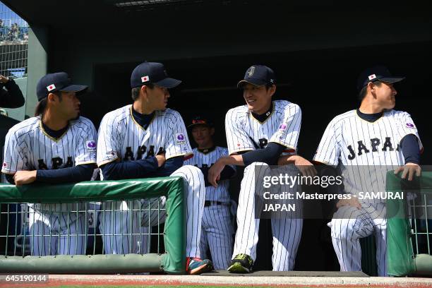 Samurai Japan team members get ready for the SAMURAI JAPAN Friendly Opening Match between SAMURAI JAPAN and Fukuoka SoftBank HAWKS at the Sun Marine...