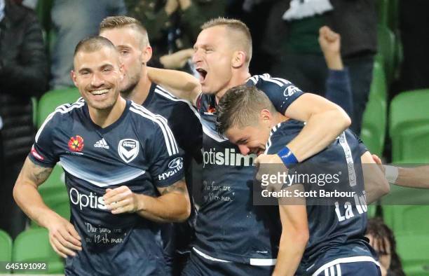 Marco Rojas of the Victory is congratulated by Besart Berisha and his teammates after scoring the first goal during the round 21 A-League match...