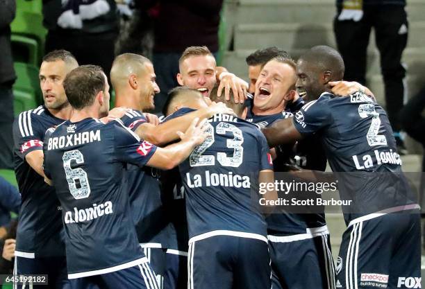 Marco Rojas of the Victory is congratulated by Besart Berisha and his teammates after scoring the first goal during the round 21 A-League match...