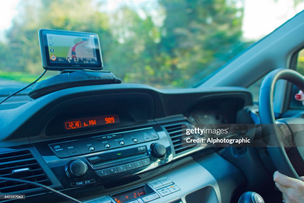 Dashboard mounted sat nav.