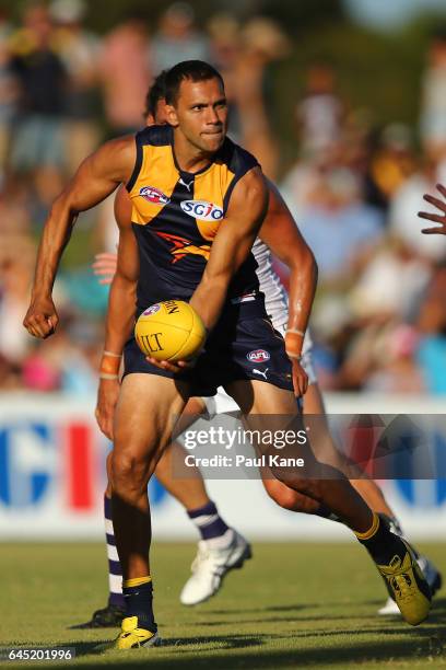 Josh Hill of the Eagles looks to pass the ball during the JLT Community Series AFL match between the West Coast Eagles and the Fremantle Dockers at...