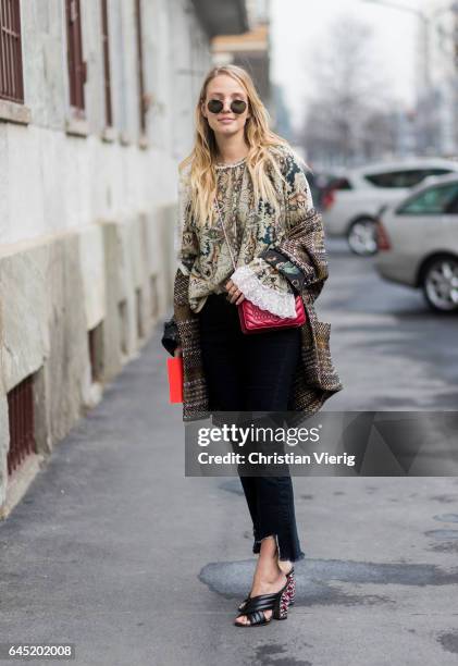 Leonie Sophie Hanne wearing cropped denim jeans, Gucci mules outside Etro during Milan Fashion Week Fall/Winter 2017/18 on February 24, 2017 in...