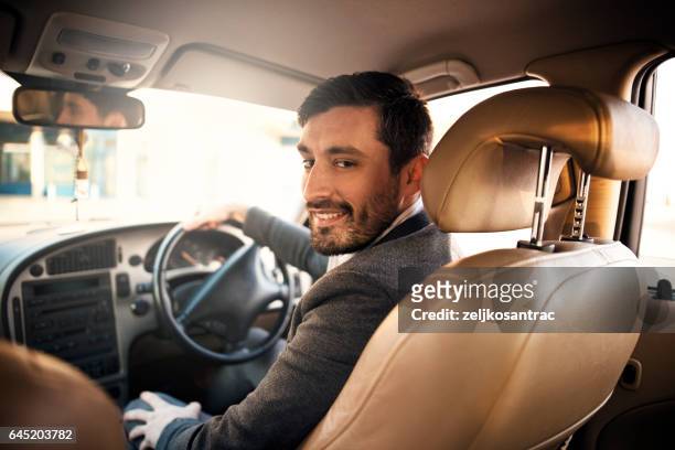 portrait of man in his car - audi interior stock pictures, royalty-free photos & images