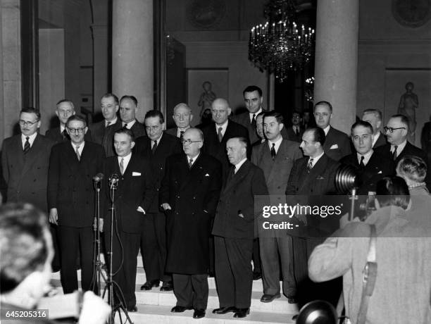 New elected French President of the Council Georges Bidault pose with members of the French government at the Elysee Palace in Paris on October 28,...