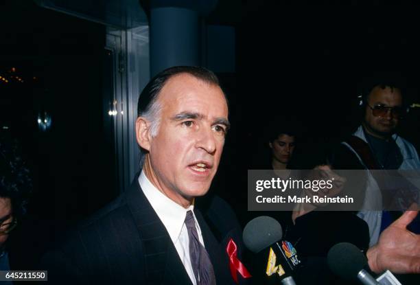 American politician and Democratic Presidential candidate Jerry Brown talks with reporters outside the ABC studios, Washington DC, May 9, 1992. He...