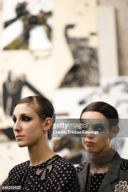 Models prepare backstage ahead of the Antonio Marras show during Milan Fashion Week Fall/Winter 2017/18 on February 25, 2017 in Milan, Italy.
