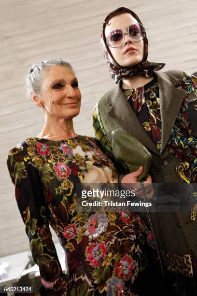 Benedetta Barzini and a model prepare backstage ahead of the Antonio Marras show during Milan Fashion Week Fall/Winter 2017/18 on February 25, 2017...