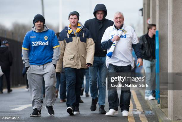 Leeds United fans walk to Elland Road before the Sky Bet Championship match between Leeds United and Sheffield Wednesday on February 25, 2017 in...