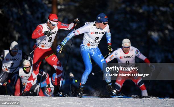 Alex Harvey of Canada and Matti Heikkinen of Finland compete in the Men's Cross Country Skiathlon during the FIS Nordic World Ski Championships on...