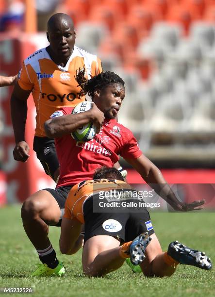 Howard Mnisi of the Lions getting tagged by Clinton Swart of the Cheetahs during the Super Rugby match between Toyota Cheetahs and Emirates Lions at...