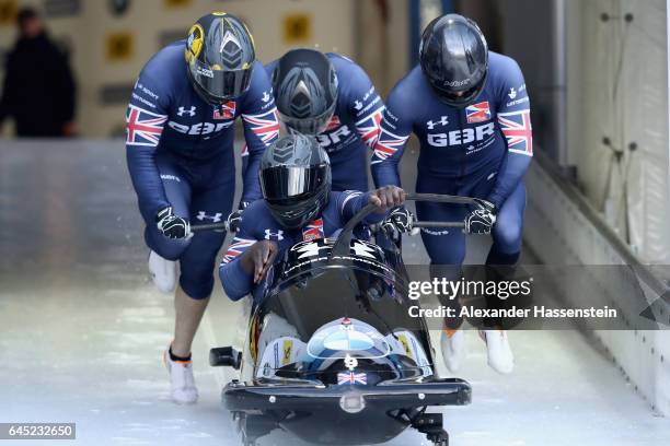 Pilot Lamin Dean of Great Britain competes with Ben Simons, John Baines and Andrew Matthews during the first run of the IBSF World Championships Bob...