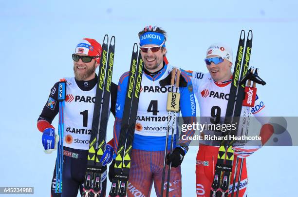 Martin Johnsrud Sundby of Norway , Sergey Ustiugov of Russia , Finn Haagen Krogh of Norway pose after the Men's Cross Country Skiathlon during the...