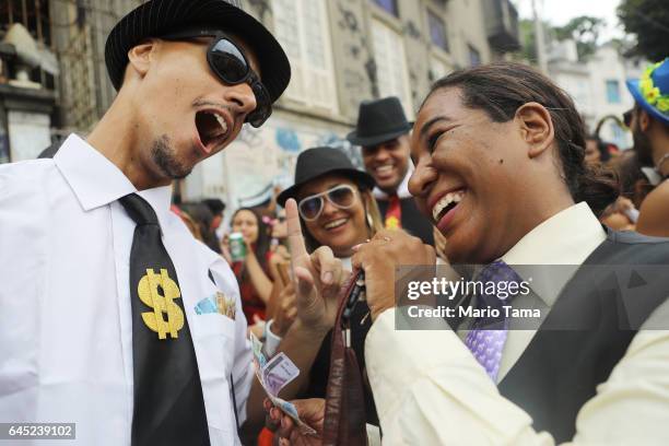 Revelers joke at the Ceu Na Terra 'bloco', or street party, on the second official day of Carnival on February 25, 2017 in Rio de Janeiro, Brazil. Up...