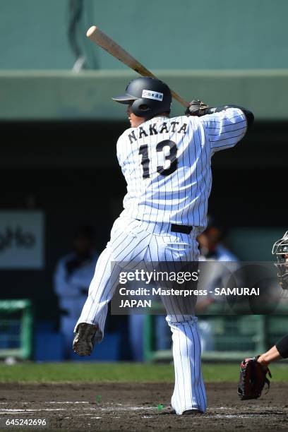 Sho Nakata of Samurai Japan bats during the SAMURAI JAPAN Friendly Opening Match between SAMURAI JAPAN and Fukuoka SoftBank HAWKS at the Sun Marine...