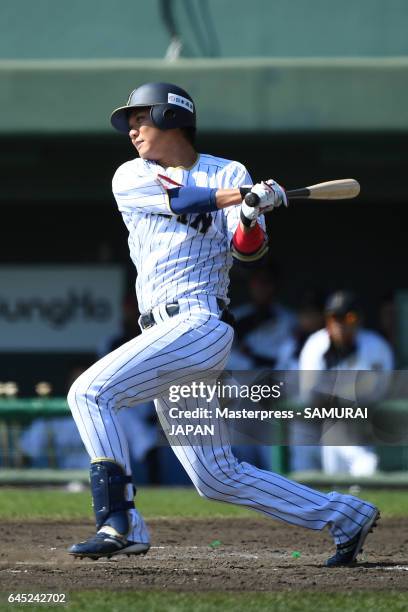 Hayato Sakamoto of Samurai Japan bats during the SAMURAI JAPAN Friendly Opening Match between SAMURAI JAPAN and Fukuoka SoftBank HAWKS at the Sun...