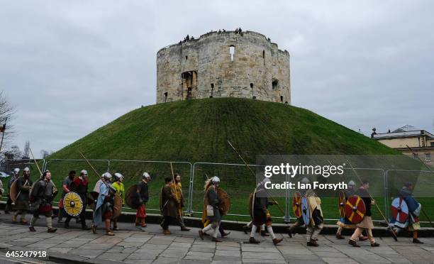 Viking re-enactors from Canute's Army march to Coppergate in a show of strength before battle during a living history display on February 25, 2017 in...