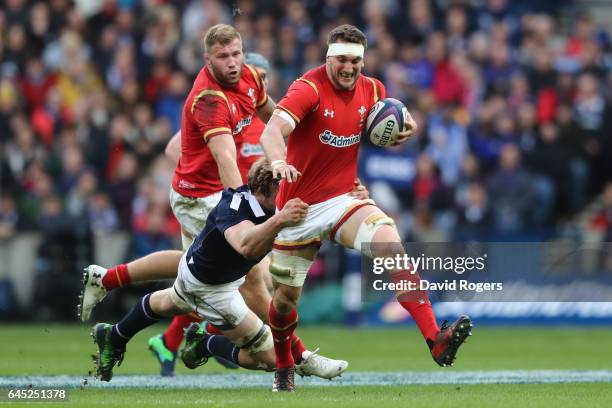 Sam Warburton of Wales is tackled by Richie Gray of Scotland during the RBS Six Nations match between Scotland and Wales at Murrayfield Stadium on...