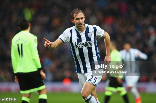 Craig Dawson of West Bromwich Albion celebrates scoring his sides first goal during the Premier League match between West Bromwich Albion and AFC...