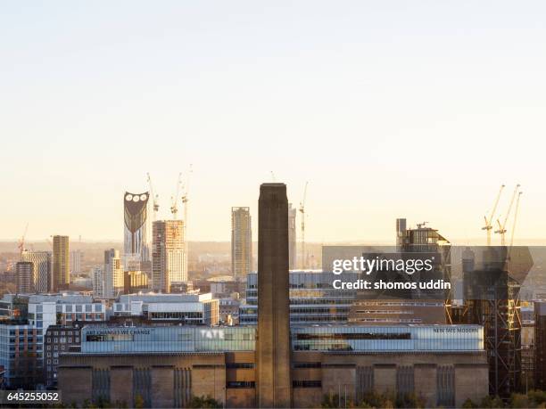 tate modern and the changing city skyline at sunset - tate modern london stock pictures, royalty-free photos & images