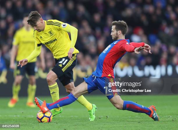 Yohan Cabaye of Crystal Palace tackles Gaston Ramirez of Middlesbrough during the Premier League match between Crystal Palace and Middlesbrough at...