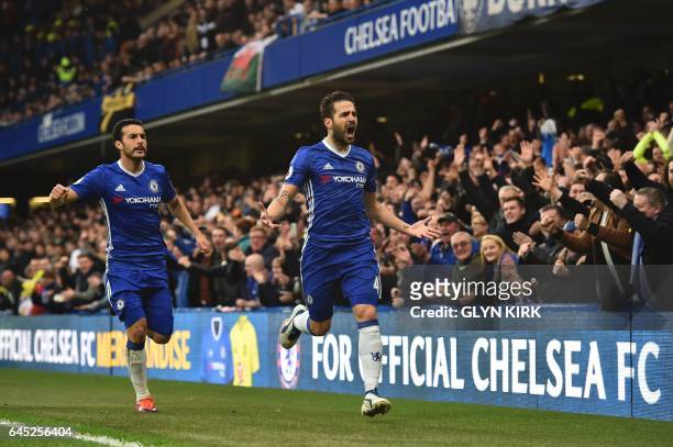 Chelsea's Spanish midfielder Cesc Fabregas celebrates scoring the opening goal during the English Premier League football match between Chelsea and...