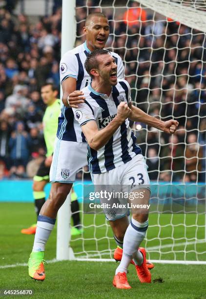 Gareth McAuley of West Bromwich Albion celebrates scoring his sides second goal with Jose Salomon Rondon of West Bromwich Albion during the Premier...