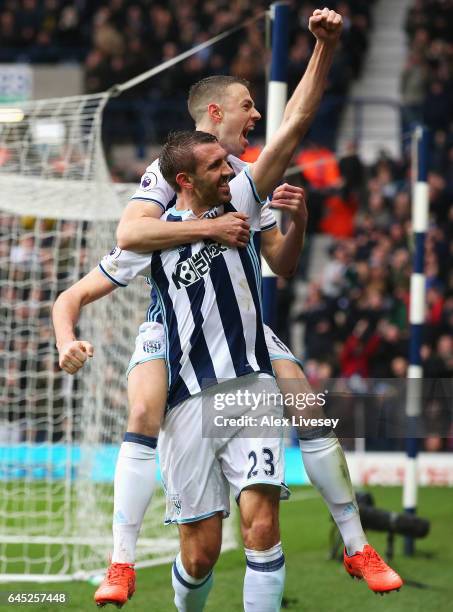 Gareth McAuley of West Bromwich Albion celebrates scoring his sides first goal with his West Bromwich Albion team mates during the Premier League...