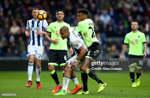 Jose Salomon Rondon of West Bromwich Albion and Tyrone Mings of AFC Bournemouth battle for possession during the Premier League match between West...