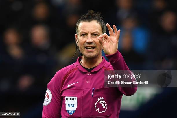 Referee Mark Clattenburg gestures during the Premier League match between West Bromwich Albion and AFC Bournemouth at The Hawthorns on February 25,...