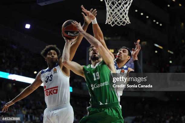 Furkan Aldemir, #19 center of Darussafaka Dogus Istanbul and Trey Thompkins, #33 center of Real Madrid and Gustavo Ayon, #14 center of Real Madrid...