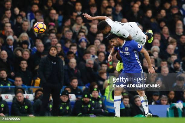 Swansea City's English defender Kyle Naughton climbs above Chelsea's Brazilian-born Spanish striker Diego Costa during the English Premier League...