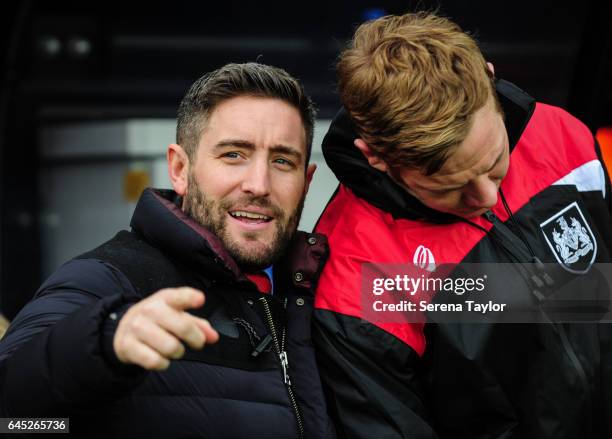 Bristol City Manager Lee Johnson stands in the dugouts talking to a staff member during the Sky Bet Championship Match between Newcastle United and...