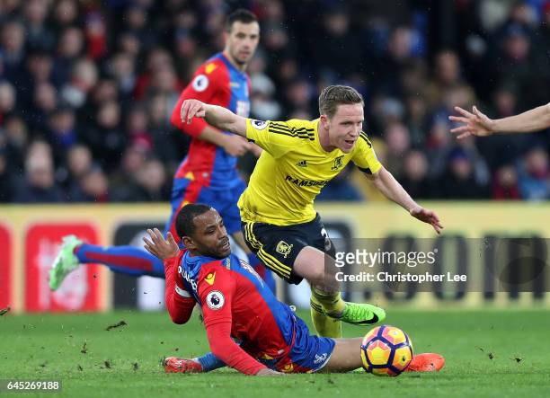 Jason Puncheon of Crystal Palace tackles Adam Forshaw of Middlesbrough during the Premier League match between Crystal Palace and Middlesbrough at...