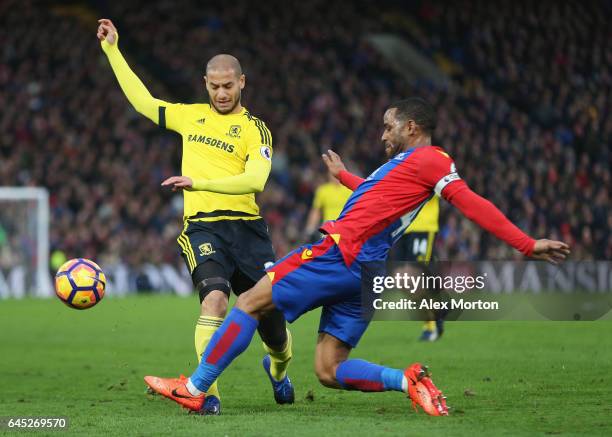 Adlene Guedioura of Middlesbrough and Jason Puncheon of Crystal Palace battle for possession during the Premier League match between Crystal Palace...