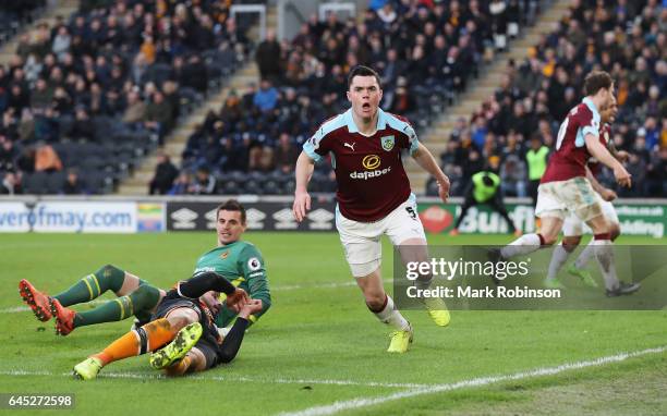 Michael Keane of Burnley celebrates scoring his sides first goal during the Premier League match between Hull City and Burnley at KCOM Stadium on...