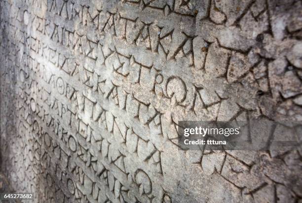 greek lettering in aphrodisias - ancient roman alphabet stock pictures, royalty-free photos & images