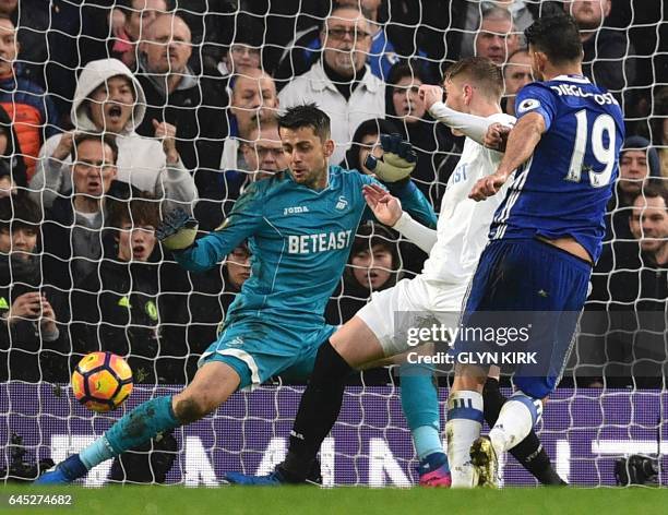 Chelsea's Brazilian-born Spanish striker Diego Costa scores their third goal during the English Premier League football match between Chelsea and...