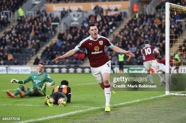 Michael Keane of Burnley celebrates scoring his sides first goal during the Premier League match between Hull City and Burnley at KCOM Stadium on...