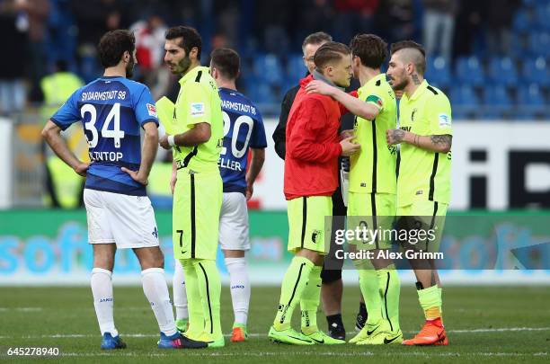 Hamit Altintop of Darmstadt and Halil Altintop of Augsburg chat after the Bundesliga match between SV Darmstadt 98 and FC Augsburg at...