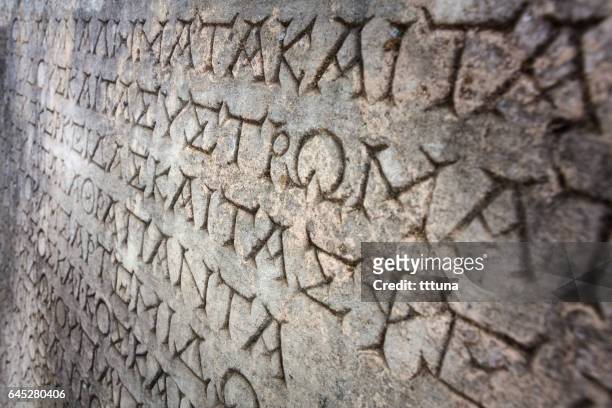 greek lettering in aphrodisias - ancient greek alphabet stock pictures, royalty-free photos & images